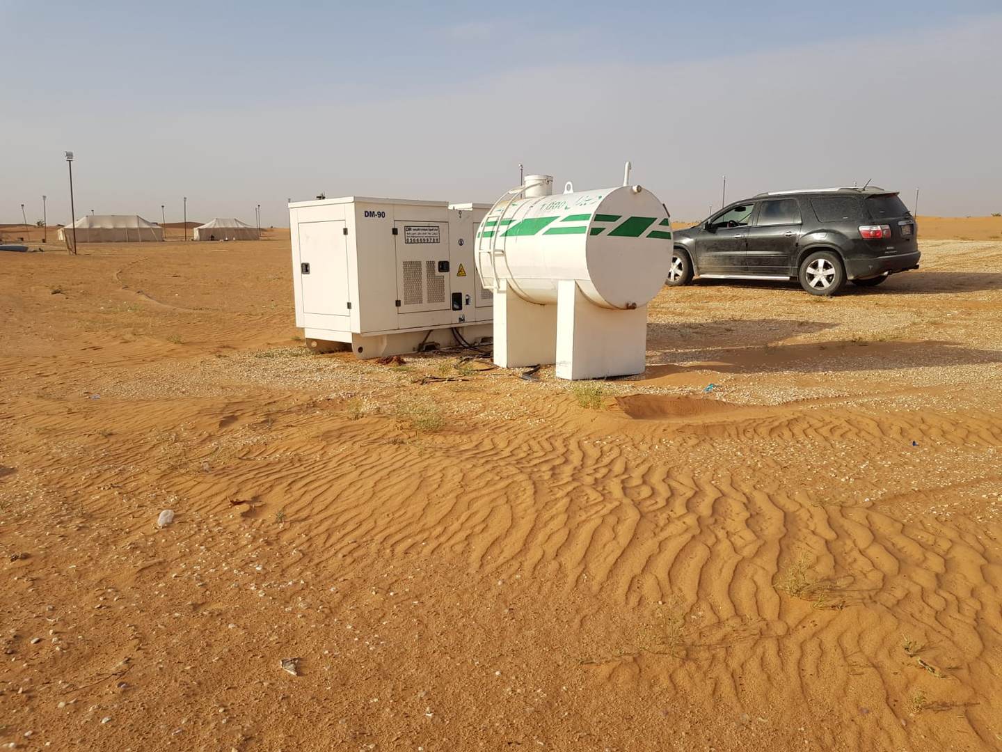 Generator and fuel tank installed at desert camp site