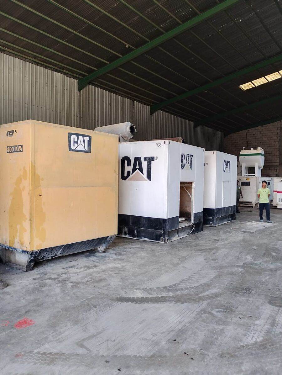 CAT generator fleet staged in warehouse ready for deployment