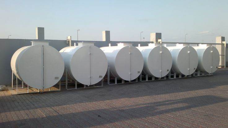 White Dream diesel fuel tank installed beside a generator on site