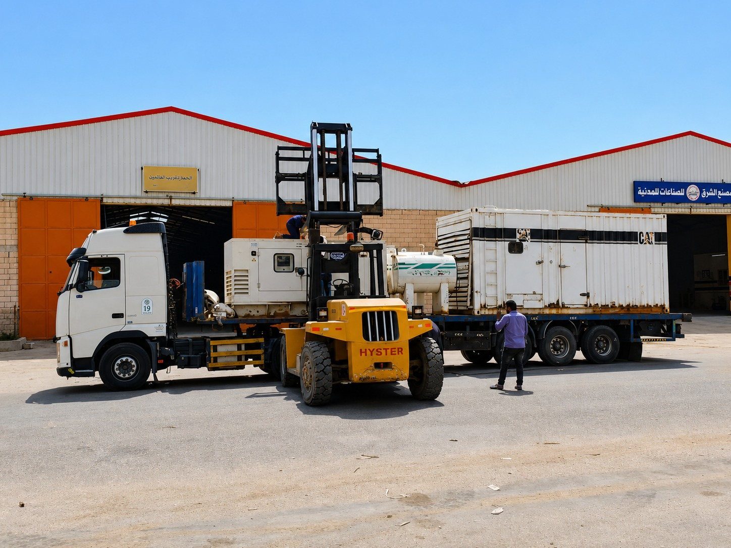 New and used CAT diesel generators being loaded for delivery from White Dream's Saudi Arabia warehouse