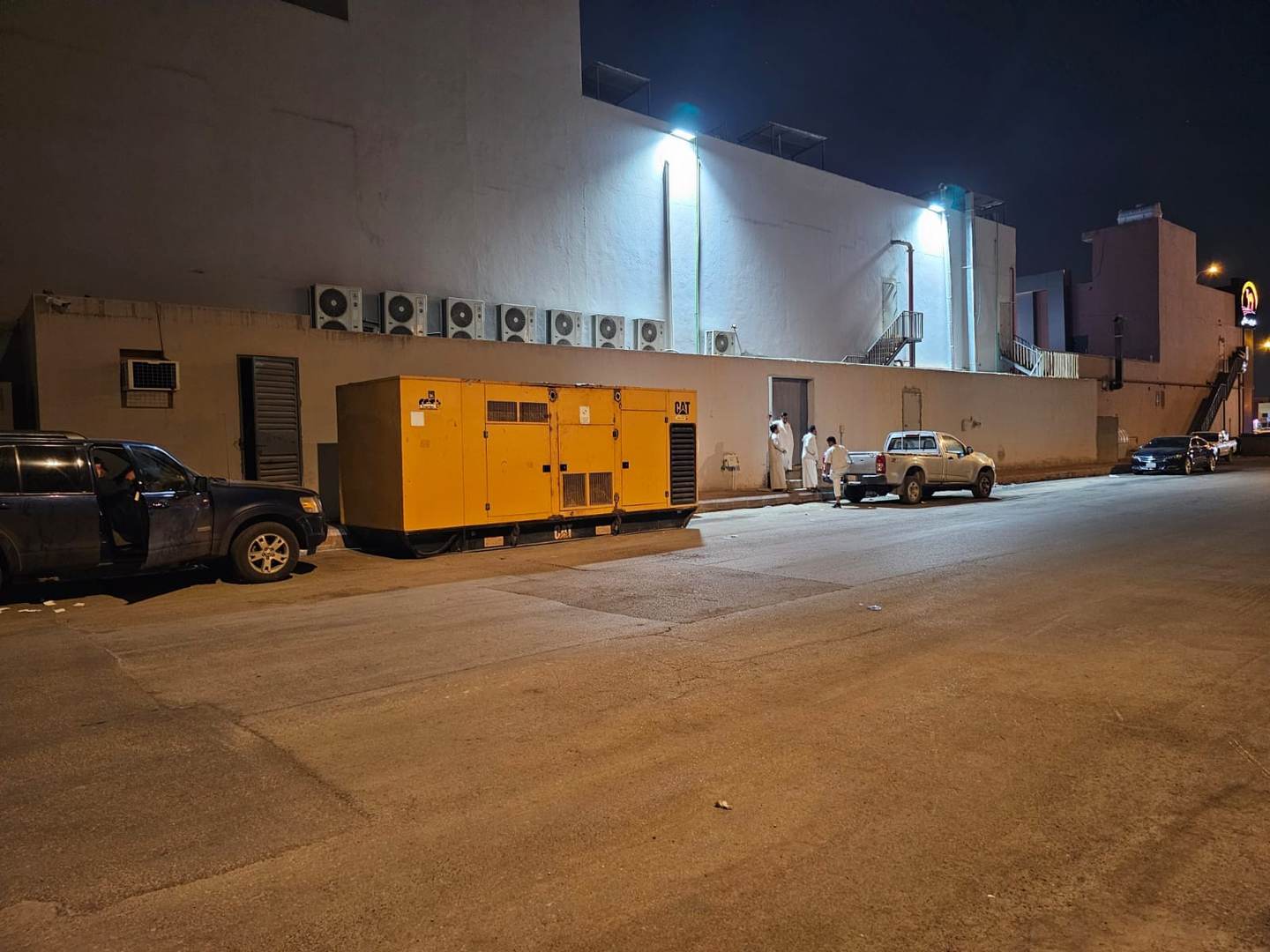 White Dream commercial generator installation at night in Riyadh, Saudi Arabia
